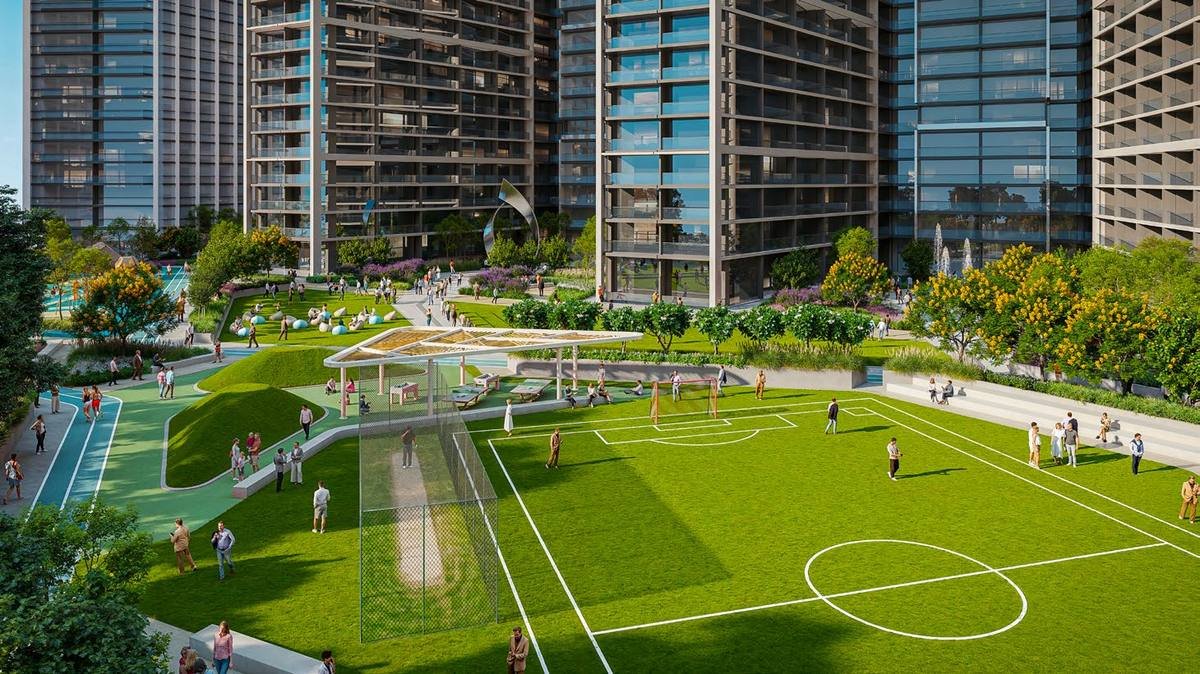 Podium-level football lawn and outdoor exercise area at Sobha Central
